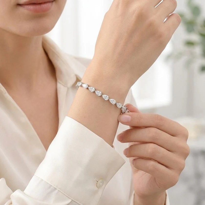 GIA Certified 8.10CT D/VS1-2 Pear Diamond Claw Set Tennis Bracelet in Platinum (950) - Image 4