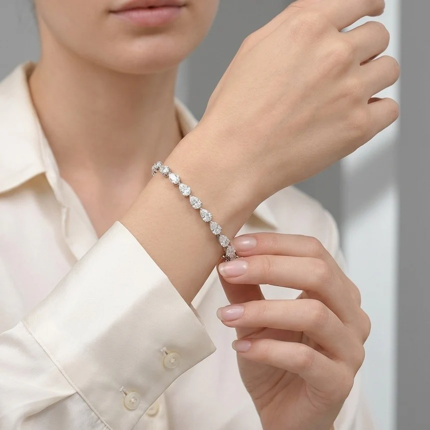 GIA Certified 8.10CT D/VS1-2 Pear Diamond Claw Set Tennis Bracelet in Platinum (950) - Image 5