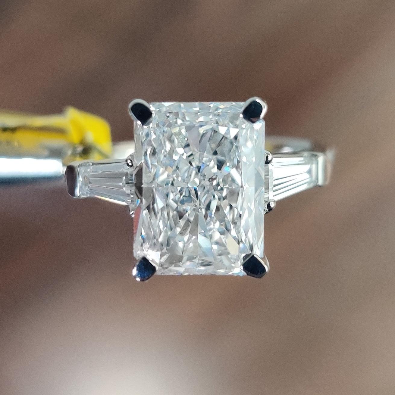 IGI Certified F/VS 5.50 Carat Radiant & Diamond Trilogy Ring Platinum - Image 2